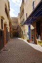 Old alley in MAZAGAN, Morocco - vertical Royalty Free Stock Photo