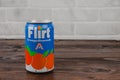 An old aluminium can of Flirt soft drink against the brick wall Royalty Free Stock Photo