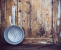 Old aluminum colander