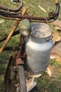 Old aluminum milk churn used by farmers to bring fresh milk from Royalty Free Stock Photo