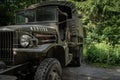 Old american army car in the woods