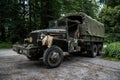 Old american army car in the woods