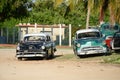 Old american car on beach in Trinidad Cuba Royalty Free Stock Photo