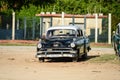 Old american car on beach in Trinidad Cuba Royalty Free Stock Photo