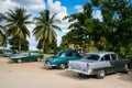 Old american car on beach in Trinidad Cuba Royalty Free Stock Photo