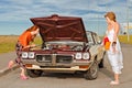 Old American car brokedown Royalty Free Stock Photo