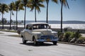Old american car drive on Malecon, Cuba