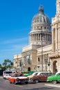Old american cars next to the Capitol in Old Havana Royalty Free Stock Photo
