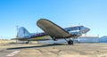 Old American Douglas plane at a California suburban airfield