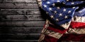 Old American flag on dark wooden background Royalty Free Stock Photo