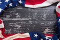 Old American Flag on wooden plank background