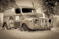 Old American van deserted rusting away