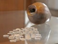 Old amphora with silver coins. Royalty Free Stock Photo