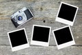 Old analog camera with blank photo frames Royalty Free Stock Photo