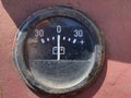 Old analog car instrument ammeter close-up Royalty Free Stock Photo