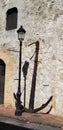 Old Anchor & Art next to an old historic building in Santo Domingo Royalty Free Stock Photo