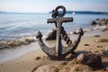 Old anchor on the sea coast, large heavy anchor. Old rusty anchor on the beach in the sand Royalty Free Stock Photo