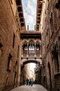 Old ancient El Pont del Bisbe - Bishop Bridge alley near Cathedral of Barcelona, Spain Royalty Free Stock Photo