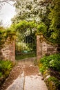 Old, ancient gate in the beautiful garden