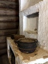 An old ancient kitchen with iron cauldrons Royalty Free Stock Photo