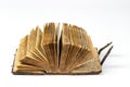 Old ancient open book on white background Royalty Free Stock Photo