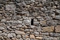 Old ancient stone facade wall of medieval brick horizontal stones background Royalty Free Stock Photo