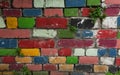 Old ancient wall with colorful bricks