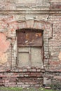 Old ancient window with grunge brick wall Royalty Free Stock Photo