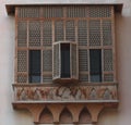 Old ancient wooden balcony with shutters of the traditional house in Egypt.