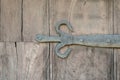 Old ancient wrought iron door medieval hinge hand forged Royalty Free Stock Photo