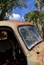 An old pickup with an antenna on front of hood Royalty Free Stock Photo