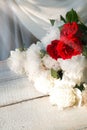 Bouquet of peonies on a table in the garden