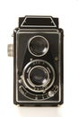 Old antique black photo camera on a white background Royalty Free Stock Photo