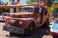 Old, antique car parked on the legendary Route 66, Seligman, Arizona, USA