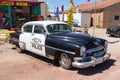 Old, antique car parked on the legendary Route 66, Seligman, Arizona, USA