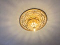 An old, antique ceiling lamp, decorative plafond with crystals