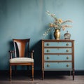 Old antique chair near light blue wood retro chest of drawers. Vintage classic home interior design of living room Royalty Free Stock Photo