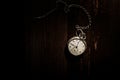 Old antique gold pocket watch with chain. Close up, open back concept. Royalty Free Stock Photo