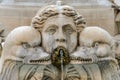 Old antique marble fountain with monster heads Royalty Free Stock Photo