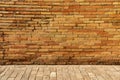 Old antique red brick wall and pavement texture. Royalty Free Stock Photo