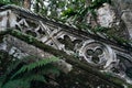 Old antique stairs with stone railings covered in green moss Royalty Free Stock Photo