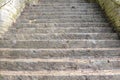 Old and antique stone stairs with sharp steps