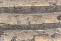 Old and antique stone stairs with sharp steps