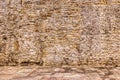 Old antique stone wall and pavement texture Royalty Free Stock Photo