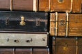 Old antique suitcases, close-up. Vintage retro styled texture. Horizontal toned