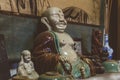 Porcelain Buddha figures in antique Chinese shop