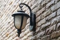 Old antique vintage outdoor lamp light on brick wall Royalty Free Stock Photo