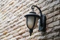 Old antique vintage outdoor lamp light on brick wall Royalty Free Stock Photo