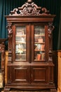 Old antique vintage wooden bookcase with books Royalty Free Stock Photo