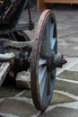 An old antique wagon wheel made of wood and metal Royalty Free Stock Photo